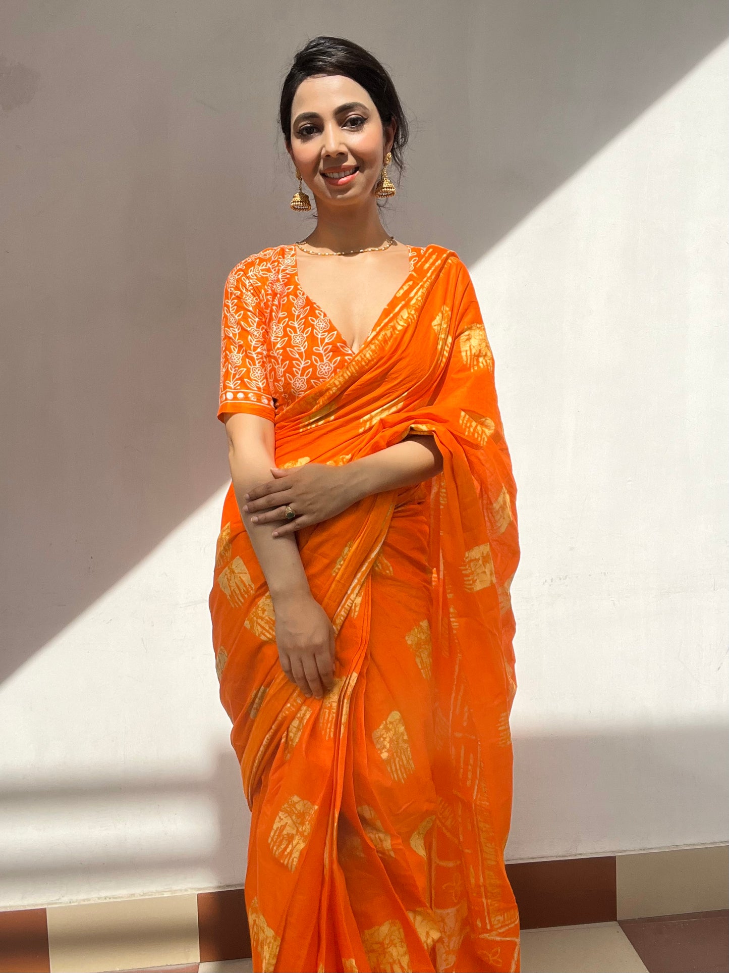 Elegant Orange Cotton Mul Printed Saree