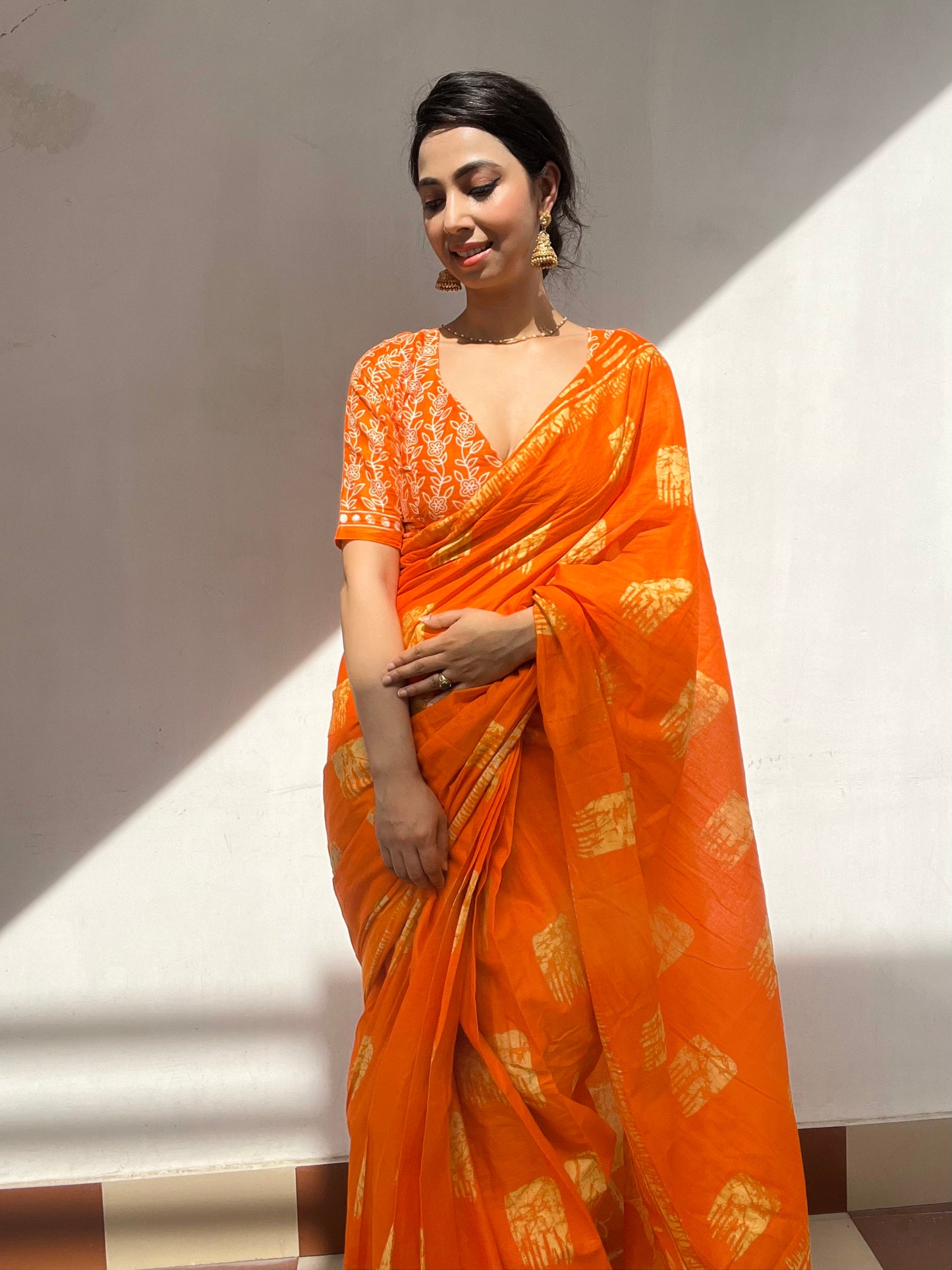 Elegant Orange Cotton Mul Printed Saree