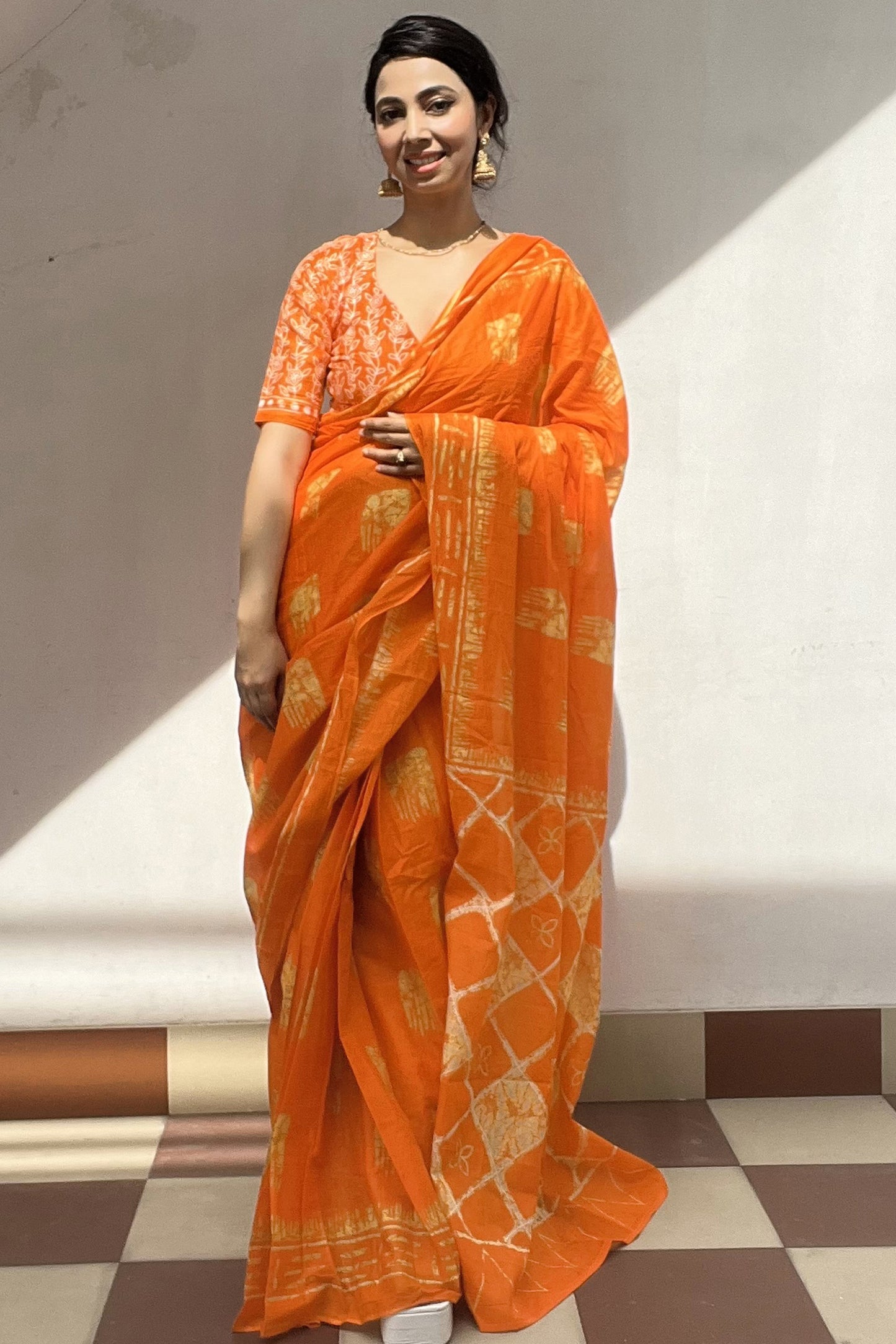 Elegant Orange Cotton Mul Printed Saree