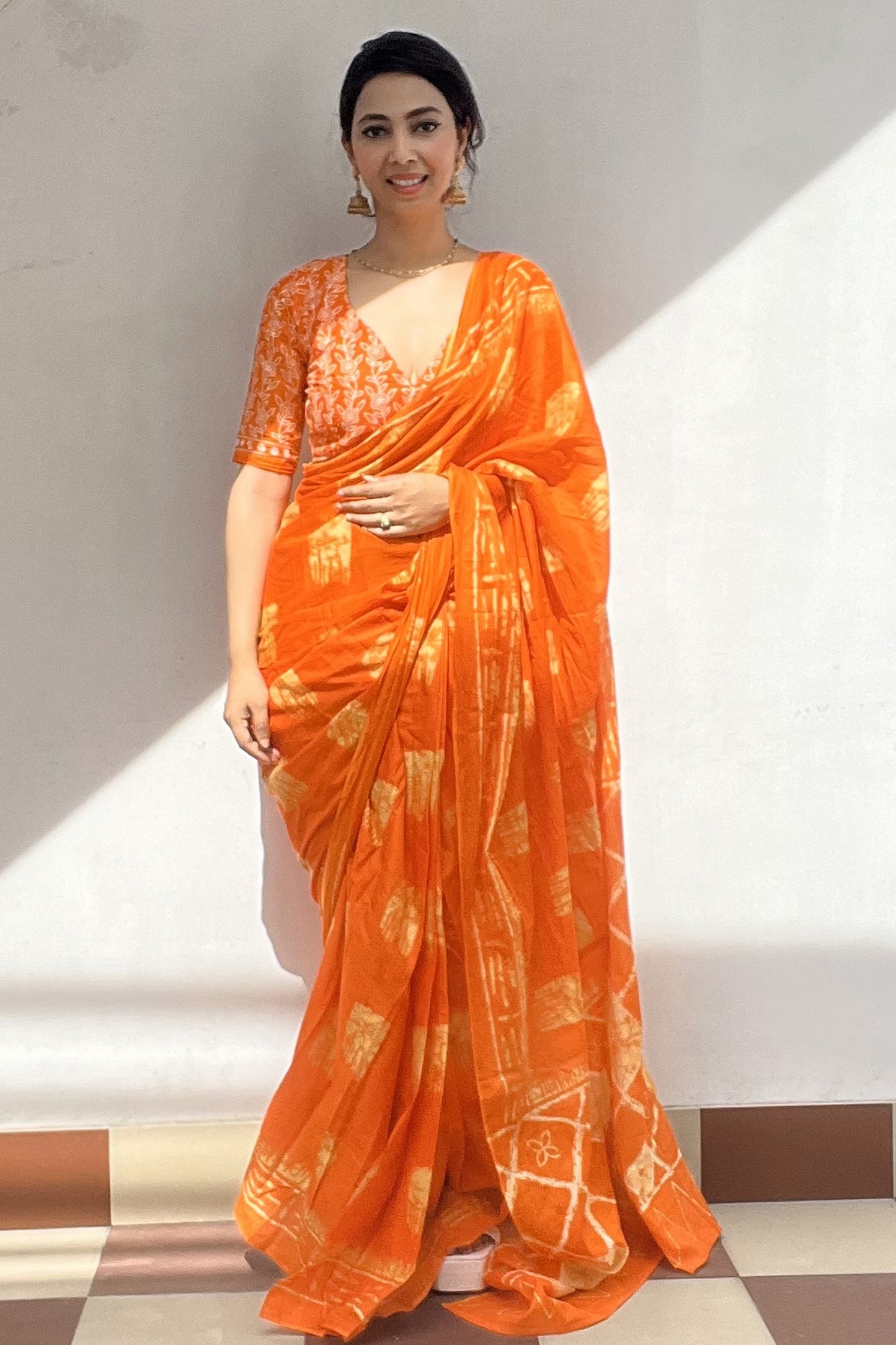 Elegant Orange Cotton Mul Printed Saree