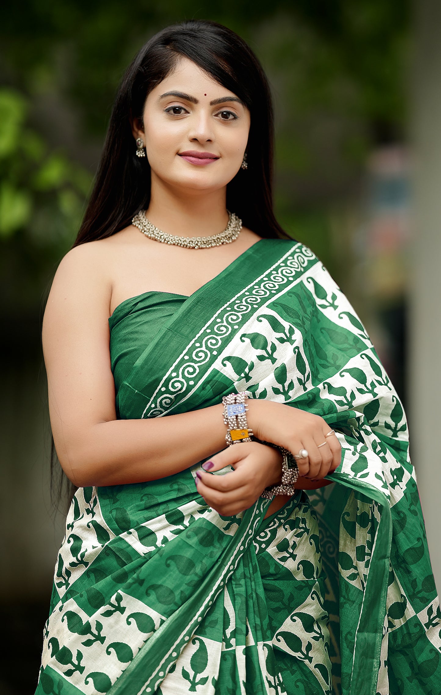 Luxurious Green Cotton Mul Printed Saree