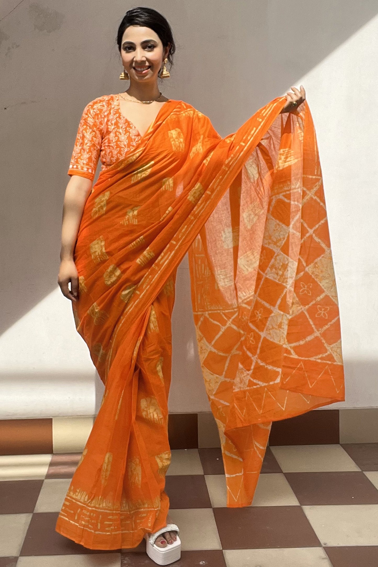 Elegant Orange Cotton Mul Printed Saree